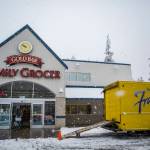 A Franz truck makes a delivery to the Gold Bar Family Grocer on Monday in Gold Bar. Eastbound access on U.S. 2 was limited to residents of Index and required a State Patrol escort. (Olivia Vanni / The Herald)