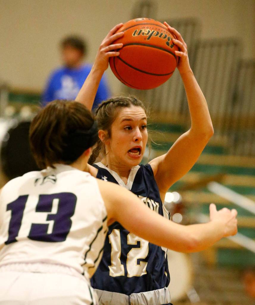 Arlington defeated Edmonds-Woodway 60-34 Thursday evening at Edmonds-Woodway High School on January 16, 2020. (Kevin Clark / The Herald)