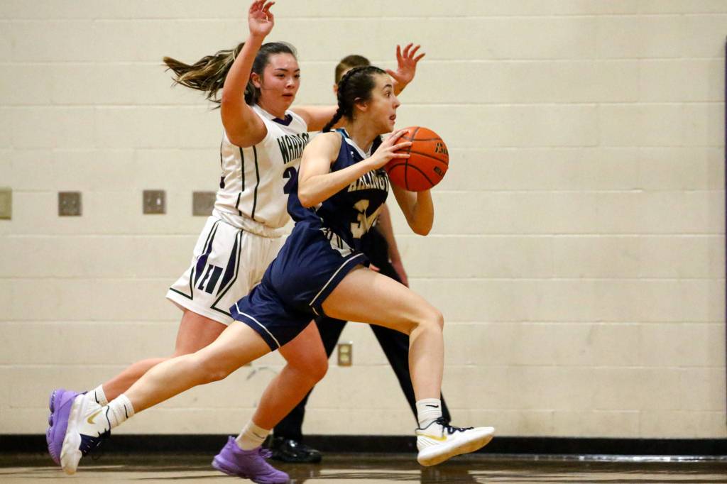 Arlington defeated Edmonds-Woodway 60-34 Thursday evening at Edmonds-Woodway High School on January 16, 2020. (Kevin Clark / The Herald)