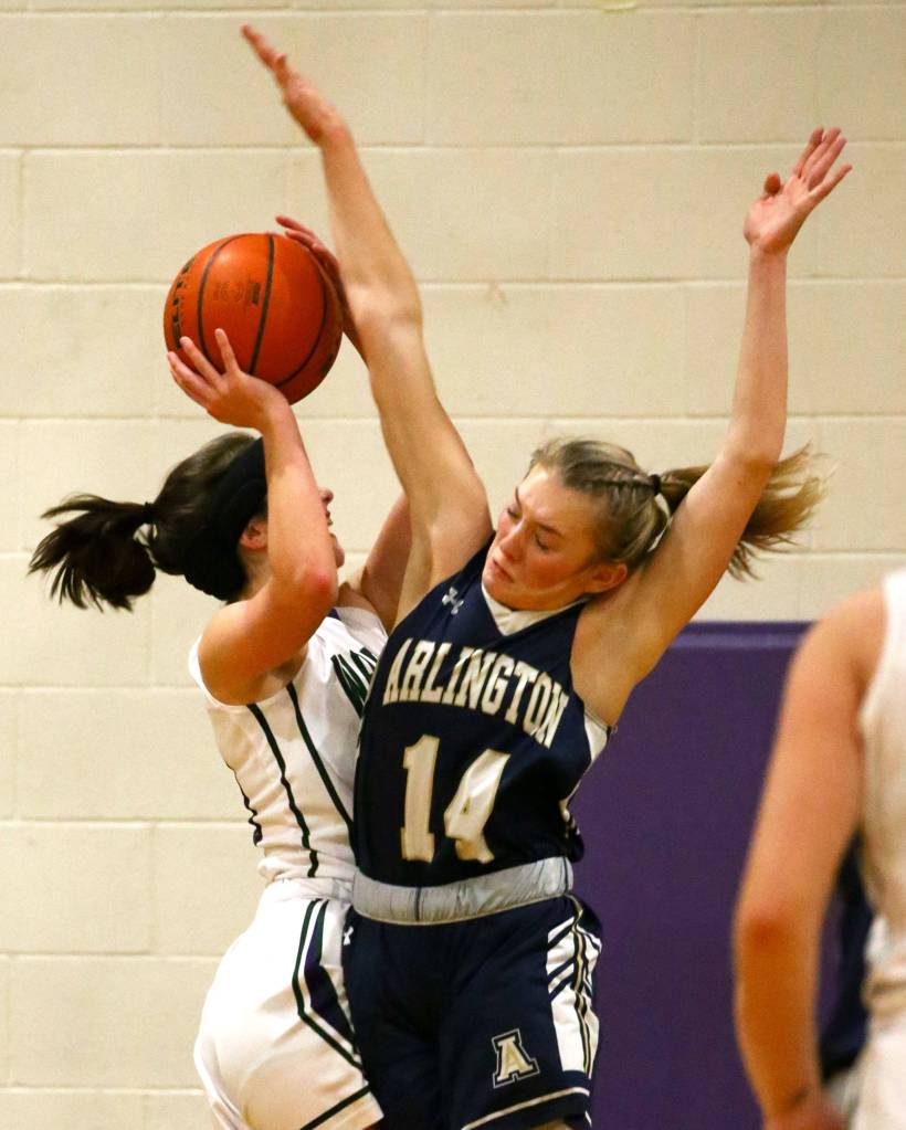 Arlington defeated Edmonds-Woodway 60-34 Thursday evening at Edmonds-Woodway High School on January 16, 2020. (Kevin Clark / The Herald)
