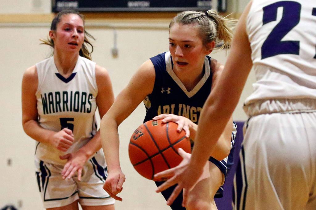 Arlington defeated Edmonds-Woodway 60-34 Thursday evening at Edmonds-Woodway High School on January 16, 2020. (Kevin Clark / The Herald)