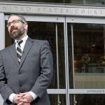 Democratic presidential elector Bret Chiafalo of Everett stands outside the U.S. Courthouse in Seattle before a hearing in 2016. (AP Photo/Elaine Thompson)
