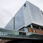 A person walks across the skybridge at Providence Regional Medical Center Everett on Tuesday. (Olivia Vanni / The Herald)