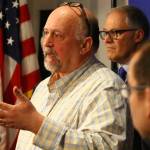 Dr. Scott Lindquist, state epidemiologist for communicable disease, takes a question during a news conference Tuesday afternoon at the state Public Health Laboratories in Shoreline. (Kevin Clark / The Herald)