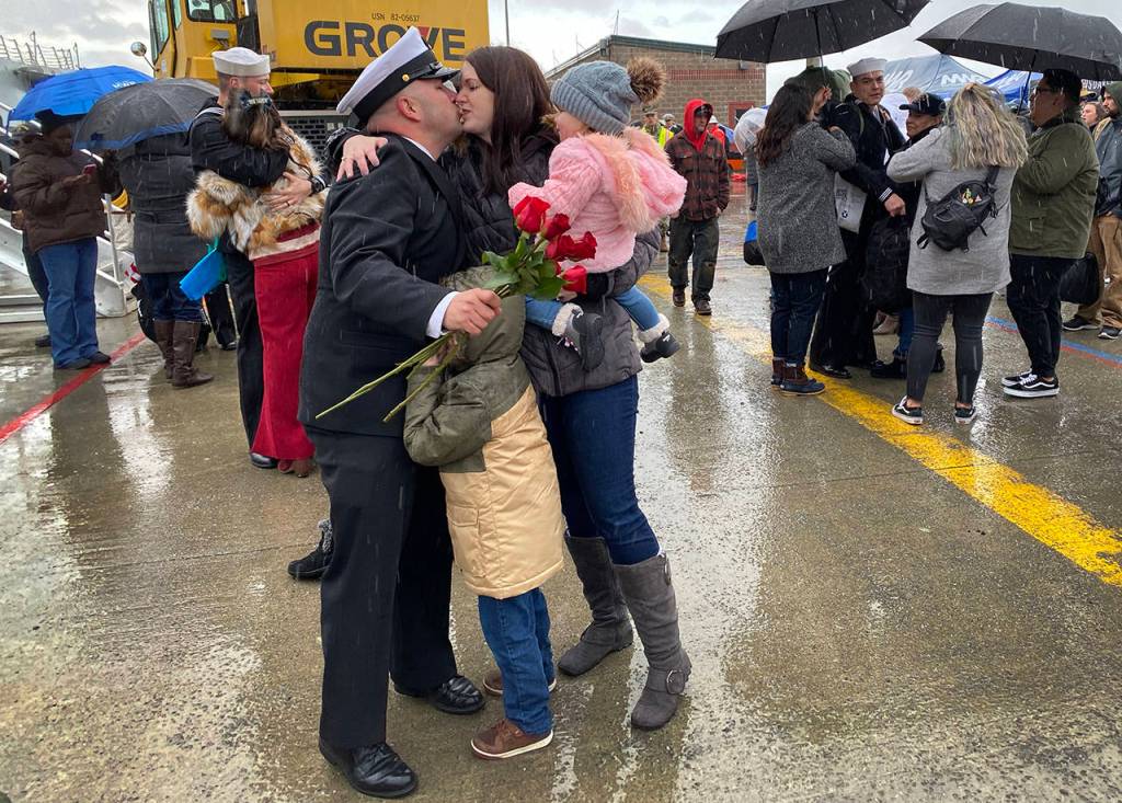 Family reunion after the arrival of the USS Gridley at Naval Station Everett on Tuesday morning. (Sue Misao / The Herald)