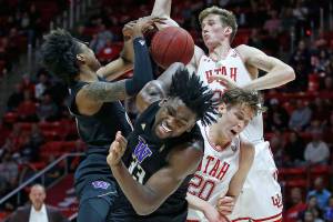 UW blows 12-point 2nd-half lead in loss to Utah