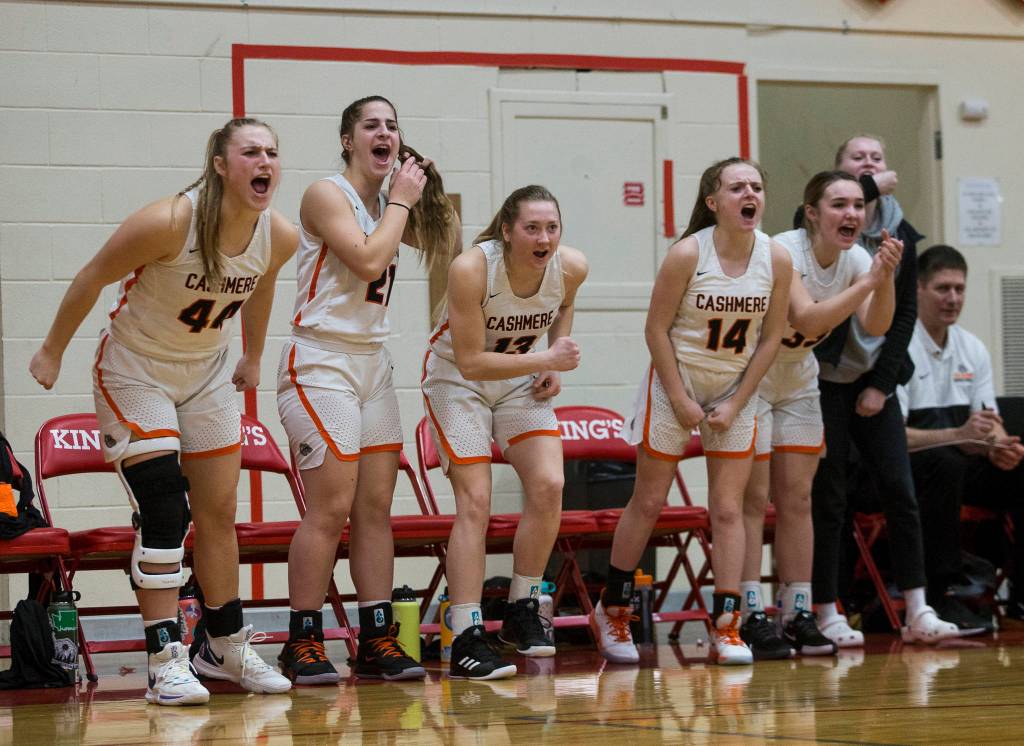 The Cashmere bench reacts to a shot during a game against Kings on Saturday in Shoreline. (Olivia Vanni / The Herald)