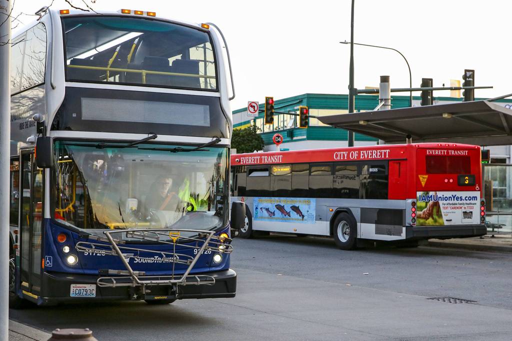 Sound Transit and Everett buses at Everett Station on Nov. 7, 2019. (Kevin Clark / Herald file)