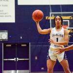 Glacier Peaks Aaliyah Collins passes to a teammate against Lake Stevens on Tuesday, Jan. 28 at Glacier Peak High School in Snohomish. (Katie Webber / The Herald)