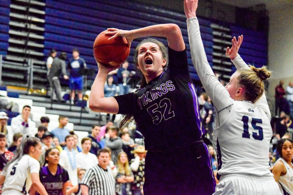 Lake Stevens Camille Jentzsch attempts a shot against Glacier Peaks Madison Rubino on Tuesday, Jan. 28 at Glacier Peak High School in Snohomish. (Katie Webber / The Herald)