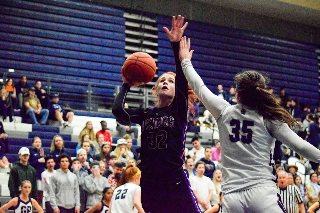 Lake Stevens Cori Wilcox attempts a shot against Glacier Peaks Maya Erling on Tuesday, Jan. 28 at Glacier Peak High School in Snohomish. (Katie Webber / The Herald)