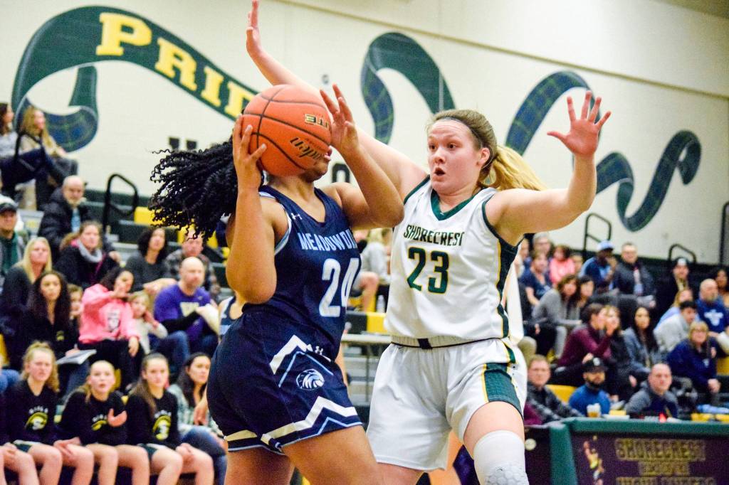 Shorecrests Sydney VanNess (right) defends Meadowdales Alicia Morrison on Thursday, Jan. 30 at Shorecrest High School in Shoreline. (Katie Webber / The Herald)