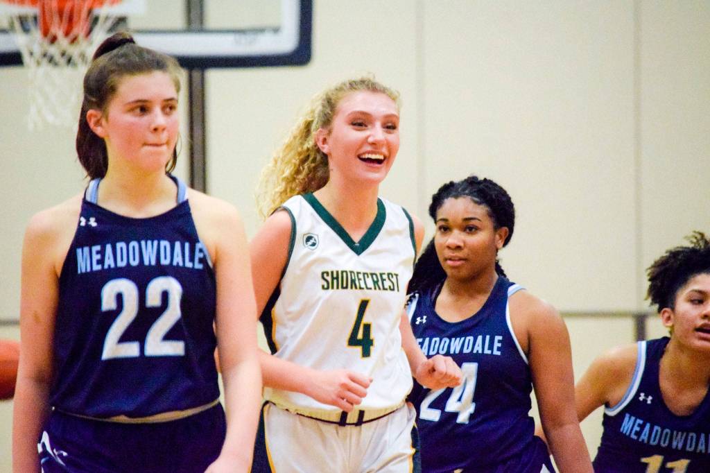 Shorecrests Maura Lee (4) smiles towards the sidelines after stopping Meadowdales offense before the half on Thursday, Jan. 30 at Shorecrest High School in Shoreline. (Katie Webber / The Herald)