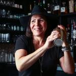 Traci McFarlane, owner of Bits in Mukilteo, not only mixes drinks but cooks all the dishes on the places small-plates menu. (Kevin Clark / The Herald)