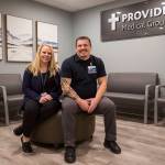 Laura Knapp (left), director of behavioral health, and counselor Jordan Larkin-Sinn (right) inside the new Behavioral Health Urgent Care Unit at Providence Regional Medical Center Everett. (Olivia Vanni / The Herald)