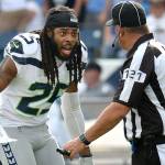 Former Seattle Seahawks cornerback Richard Sherman (25) argues a penalty call with umpire Paul King (121) during a game against the Tennessee Titans in 2017. (AP Photo/Mark Zaleski)