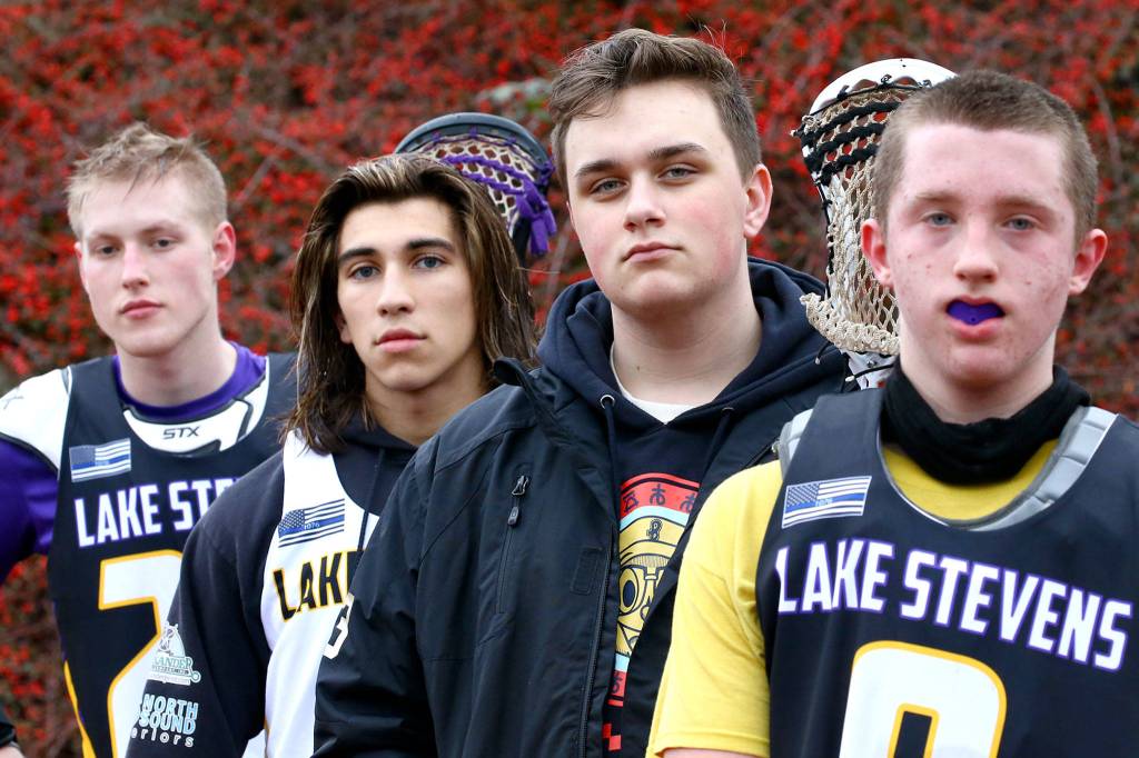 From left, Quil Cupples, Sergio Pelayo, Colton Ream and Byron Gerber are four of the five original members of the Lake Stevens lacrosse team, which is in its second year of existence. (Kevin Clark / The Herald)