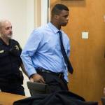 Edmond Overton enters the Snohomish County Courthouse on the opening day of his trial for first degree murder on Jan. 29 in Everett. (Andy Bronson / Herald file)