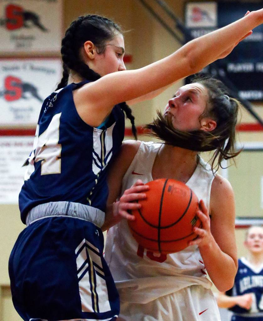 Arlington defeated Snohomish, 46-35, Thursday evening at Snohomish High School in Snohomish on February 6, 2020. (Kevin Clark / The Herald)