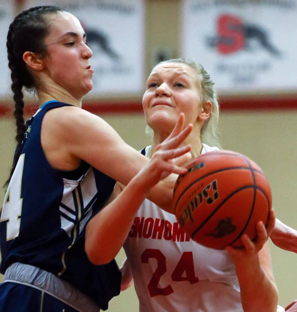 Arlington defeated Snohomish, 46-35, Thursday evening at Snohomish High School in Snohomish on February 6, 2020. (Kevin Clark / The Herald)