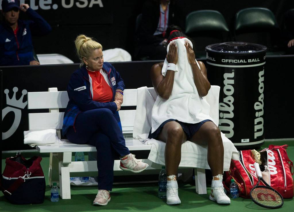 Serena Williams puts a towel over her face during a break in her match at the Fed Cup at Angel of the Winds Arena on Friday in Everett. (Olivia Vanni / The Herald)