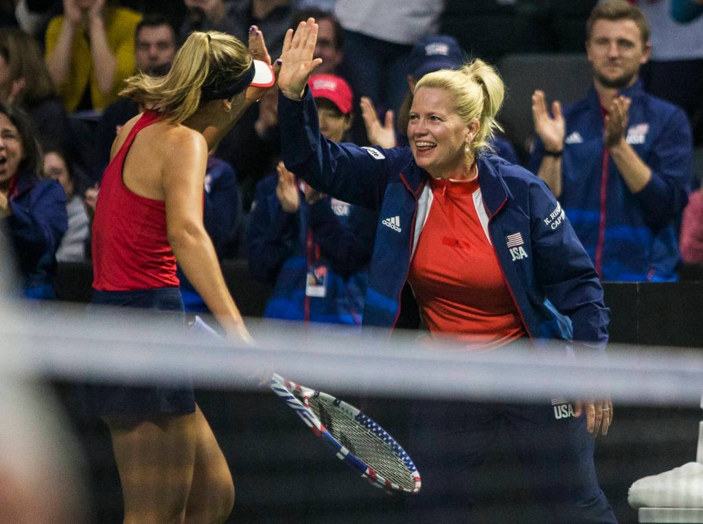 Captain Kathy Rinaldi high fives Sofia Kenin during the Fed Cup at Angel of the Winds Arena on Friday in Everett. (Olivia Vanni / The Herald)