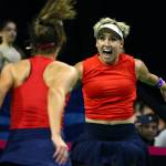Sofia Kenin (left) and Bethanie Mattek-Sands celebrate their double win to advance in FedCup 2020 Saturday evening at Angel of the Winds Arena in Everett on February 8, 2020. (Kevin Clark / The Herald)