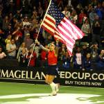 Bethanie Mattek-Sands celebrates the doubles win to advance in FedCup 2020 Saturday evening at Angel of the Winds Arena in Everett on February 8, 2020. (Kevin Clark / The Herald)
