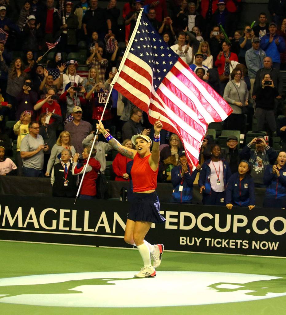 Bethanie Mattek-Sands celebrates the doubles win to advance in FedCup 2020 Saturday evening at Angel of the Winds Arena in Everett on February 8, 2020. (Kevin Clark / The Herald)