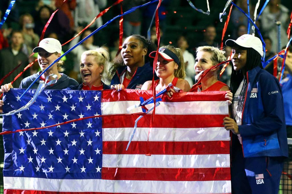 Team USA celebrates the double win to advance in FedCup 2020 Saturday evening at Angel of the Winds Arena in Everett on February 8, 2020. (Kevin Clark / The Herald)