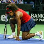 Serena Williams gets to her feet after a point during her singles match against Anastasija Sevastova during the United States Fed Cup qualifier against Latvia on Saturday at Angel of the Winds Arena in Everett. Williams lost the match in three sets. (Kevin Clark / The Herald)