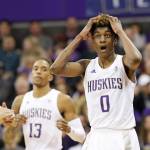 Washingtons Jaden McDaniels (0) reacts after being called for a foul against UCLAs Jaime Jaquez Jr. (left) in the first half of an NCAA college basketball game Thursday, Jan. 2, 2020, in Seattle. (AP Photo/Elaine Thompson)