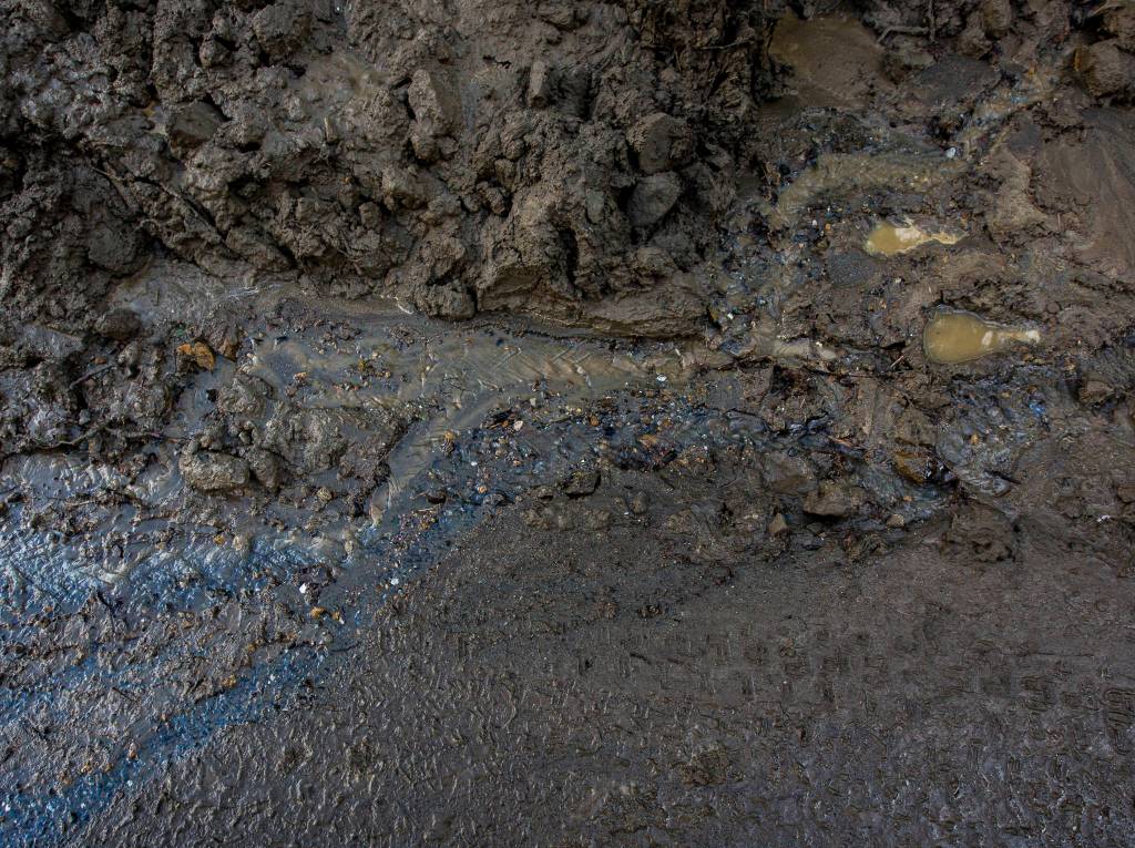 Two footprints can be seen in the leftover mud Monday in Monroe. (Olivia Vanni / The Herald)