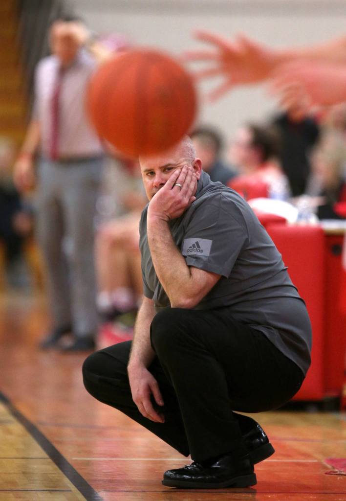 Stanwood head coach Zach Ward watches as a player inbounds the ball. Marysville Pilchuck beat Stanwood 76-31 in a basketball game Monday, Feb. 10, 2020 in Marysville. (Andy Bronson / The Herald)