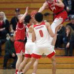 Stanwoods Kaeden McGlothin leaps to attempt a block as Marysville Pilchuck beat Stanwood 76-31 in a basketball game on Monday, Feb. 10, 2020 in Marysville. (Andy Bronson / The Herald)