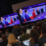 Members of the media watch the broadcast of the Democratic presidential primary debate, Feb. 7, at Saint Anselm College in Manchester, N.H. (Charles Krupa / Associated Press)