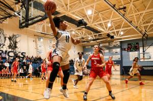 The Meadowdale and Snohomish girls basketball teams will square off in the quarterfinals of a seemingly wide-open Class 3A Northwest District Tournament. (Kevin Clark / The Herald)