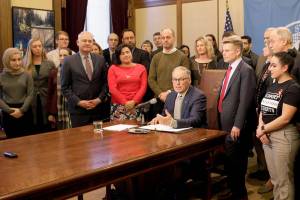 Governor signs college grant-funding bill into law