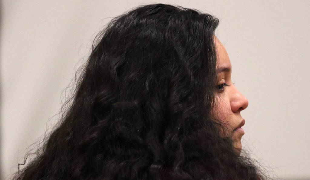 Lendsay Meza listens to opening statements during her trial at the Snohomish County Courthouse in Everett on Friday. (Andy Bronson / The Herald)