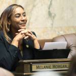 Democratic state Rep. Melanie Morgan listens Wednesday during testimony on the House floor about her bill that would ban race-based discrimination against hair texture and hairstyles. (AP Photo/Ted S. Warren)