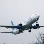 In this Dec. 11, 2019 photo, an United Airlines Boeing 737 Max airplane takes off in the rain at Renton Municipal Airport in Renton. (AP Photo/Ted S. Warren, File)