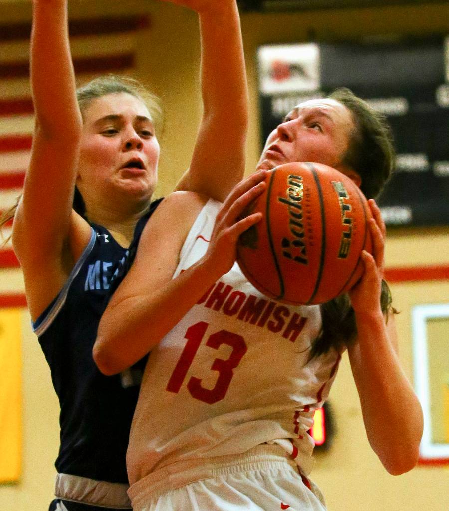 The Snohomish Panthers defeated the Meadowdale Mavericks, 57-39, in a 3A Northwest District Tournament game Friday night at Snohomish High School. (Kevin Clark / The Herald)