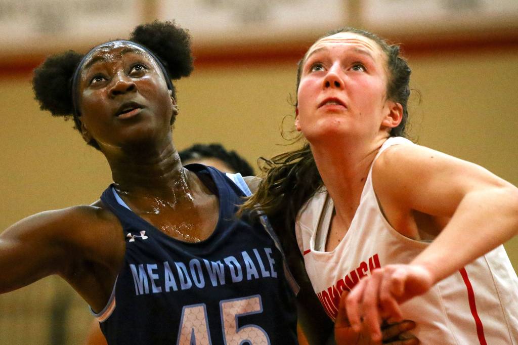The Snohomish Panthers defeated the Meadowdale Mavericks, 57-39, in a 3A Northwest District Tournament game Friday night at Snohomish High School. (Kevin Clark / The Herald)