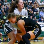 Glacier Peaks Maya Erling (rear) ties up with Inglemoors Abby Haller during a Wes-King Bi-District Tourmament game on Tuesday evening at Jackson High School in Mill Creek. (Kevin Clark / The Herald)