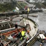 Workers break up the Argosy in January after it washed ashore at Warm Beach. Its now in pieces in Seattle. (Global Diving & Salvage)