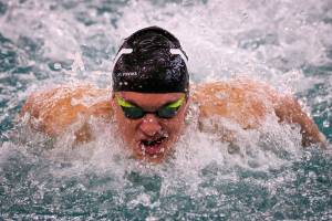 Lake Stevens Alejandro Flores competes in the butterfly portion of the 200 yard medley relay Thursday afternoon at the Snohomish County Aquatic Center in Snohomish on January 23, 2019. (Kevin Clark / The Herald)