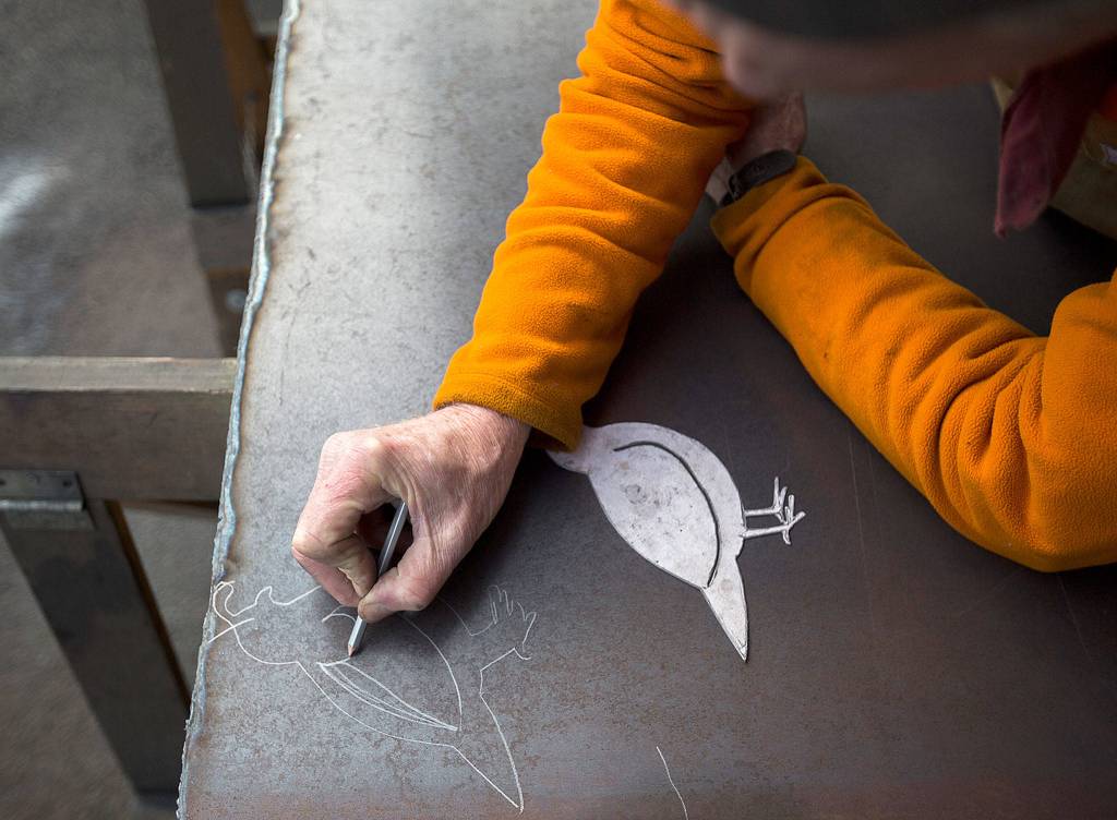 Williams garden art always begins with sketches, from which he makes patterns that are traced onto steel plate. (Olivia Vanni / The Herald)