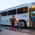 In this 2014 photo, migrants are released from ICE custody at a Greyhound bus station in Phoenix. (Michael Chow/The Arizona Republic via AP, File)