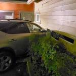 A woman in her 30s allegedly crashed her Nissan Murano into an Everett Fire Department station on Madison Street on Saturday night. (Everett Fire Department)