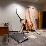 An SUV crashed into an Everett Fire Department station Saturday night. Two firefighters were in the room when the vehicle breached the wall, but were not hurt. (Everett Fire Department)